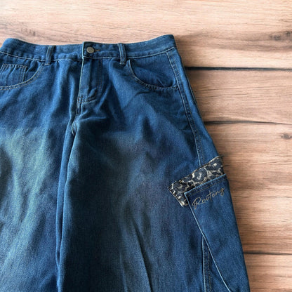 Incredible vintage style baggy wide leg skater fit jeans with leopard print in mid blue.