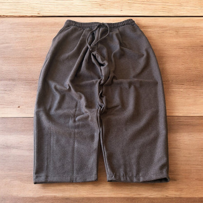 Vintage style baggy wide leg tailored wool trousers in brown.
