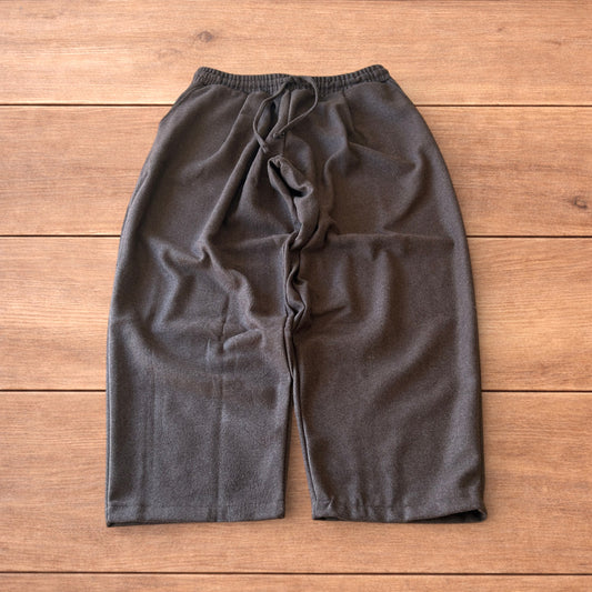 Vintage style baggy wide leg tailored wool trousers in brown.