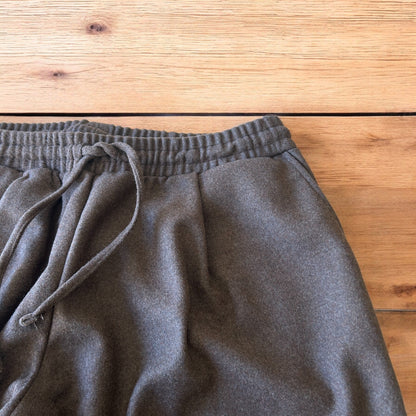 Vintage style baggy wide leg tailored wool trousers in brown.