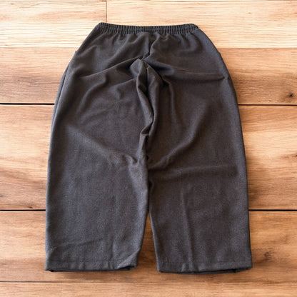 Vintage style baggy wide leg tailored wool trousers in brown.