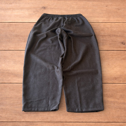 Vintage style baggy wide leg tailored wool trousers in brown.