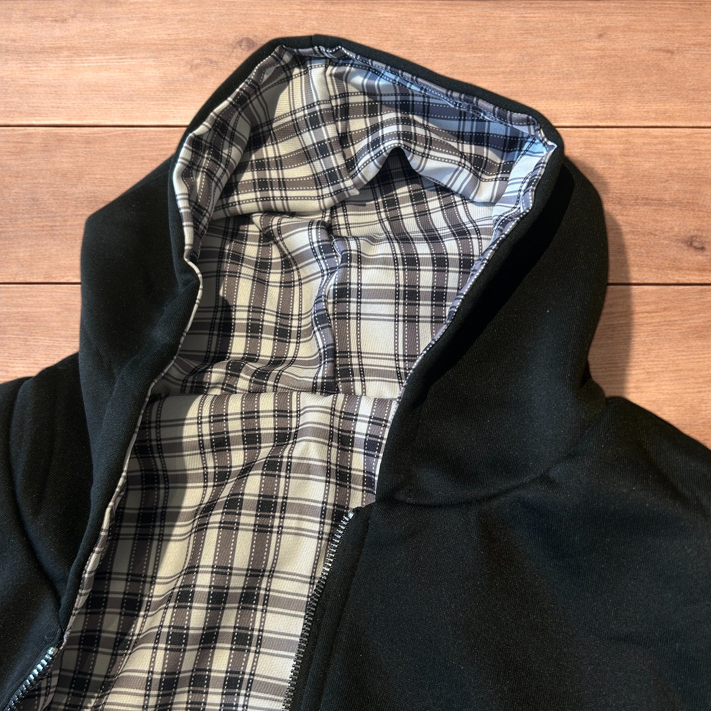 Oversized baggy reversible zip up hoodie jumper in checkered black.