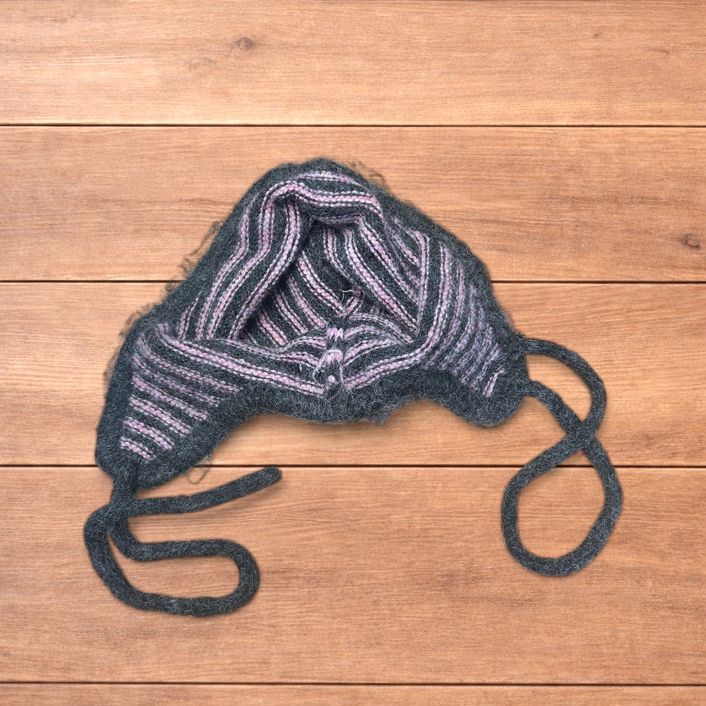Lovely vintage style knitted ear flap hat bonnet in pink/grey stripes.