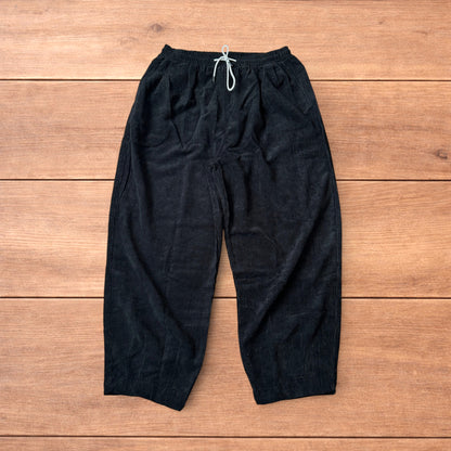 Super baggy wide leg skater corduroy trousers in black.
