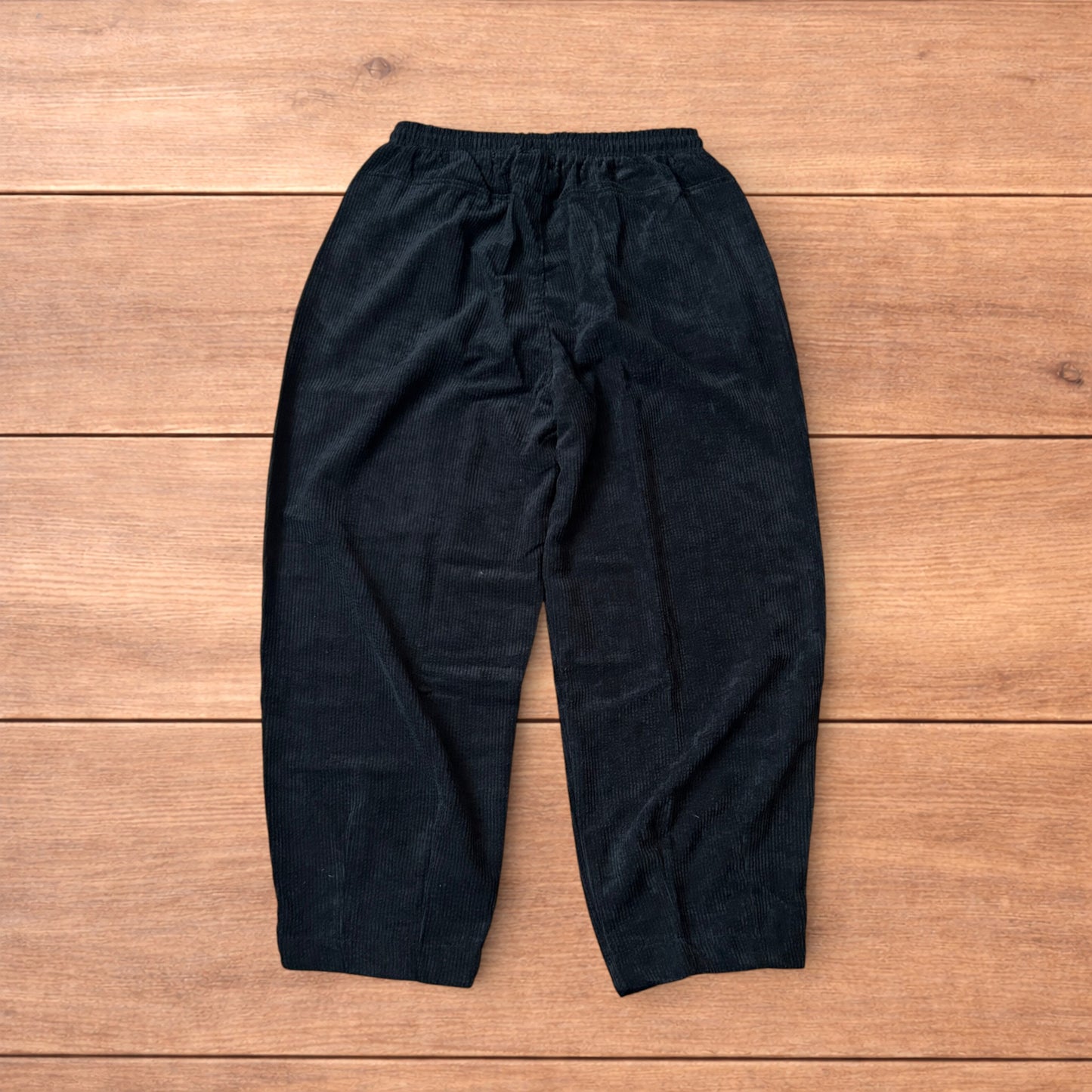 Super baggy wide leg skater corduroy trousers in black.