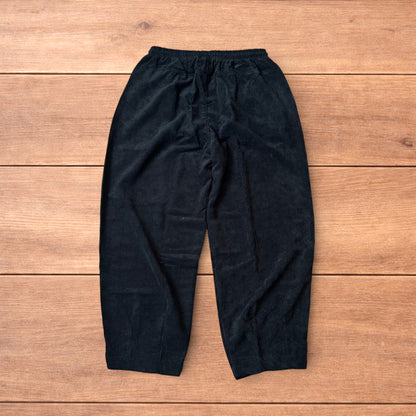 Super baggy wide leg skater corduroy trousers in black.