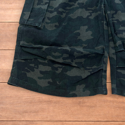Super baggy wide leg cargo carpenter shorts jorts in army camo.