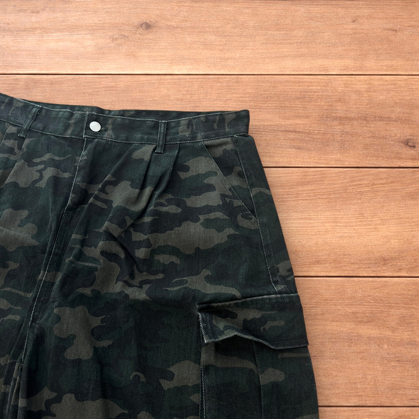 Super baggy wide leg cargo carpenter shorts jorts in army camo.