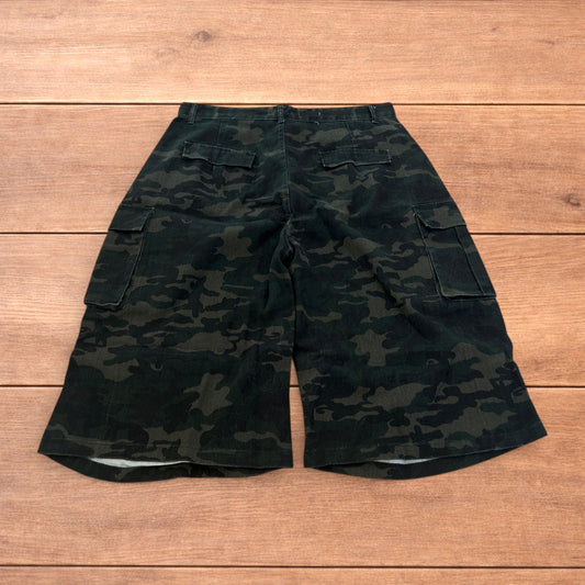Super baggy wide leg cargo carpenter shorts jorts in army camo.