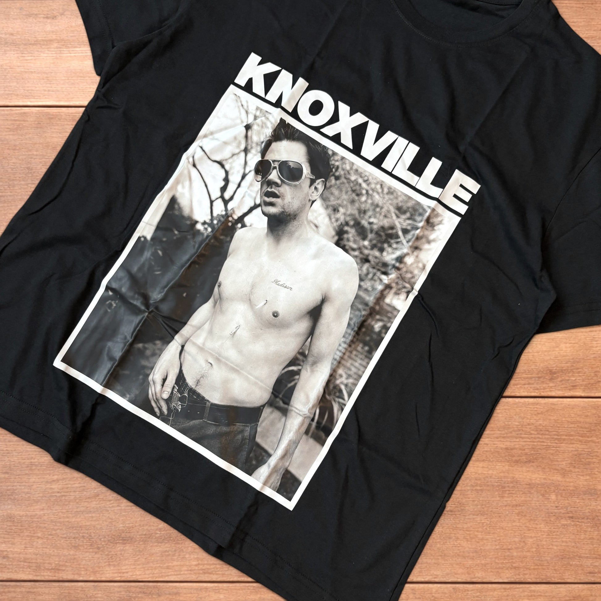 Black Jackass Knoxville t-shirt with large rectangular black and white graphic front print showing shirtless man with sunglasses