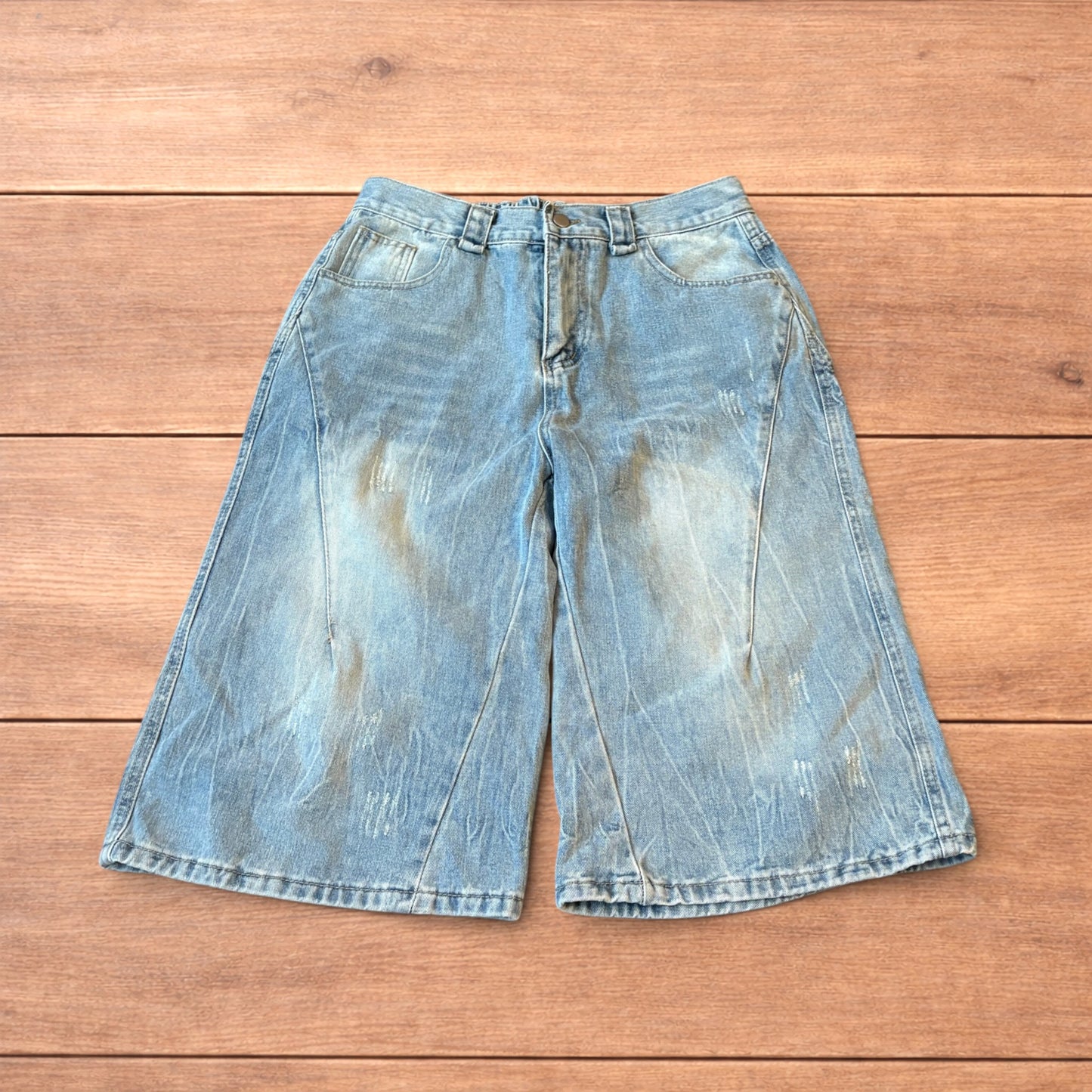 Light blue baggy wide leg denim shorts jorts with faded wash and elasticated back waistband
