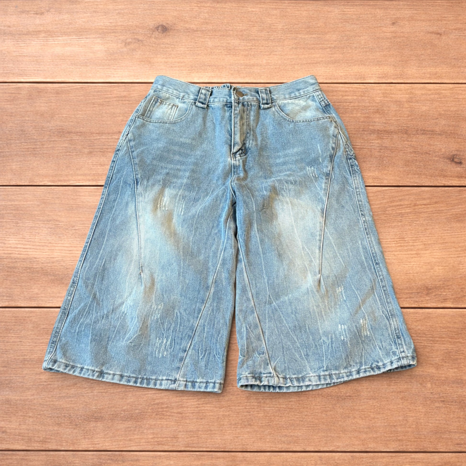 Light blue baggy wide leg denim shorts jorts with faded wash and elasticated back waistband