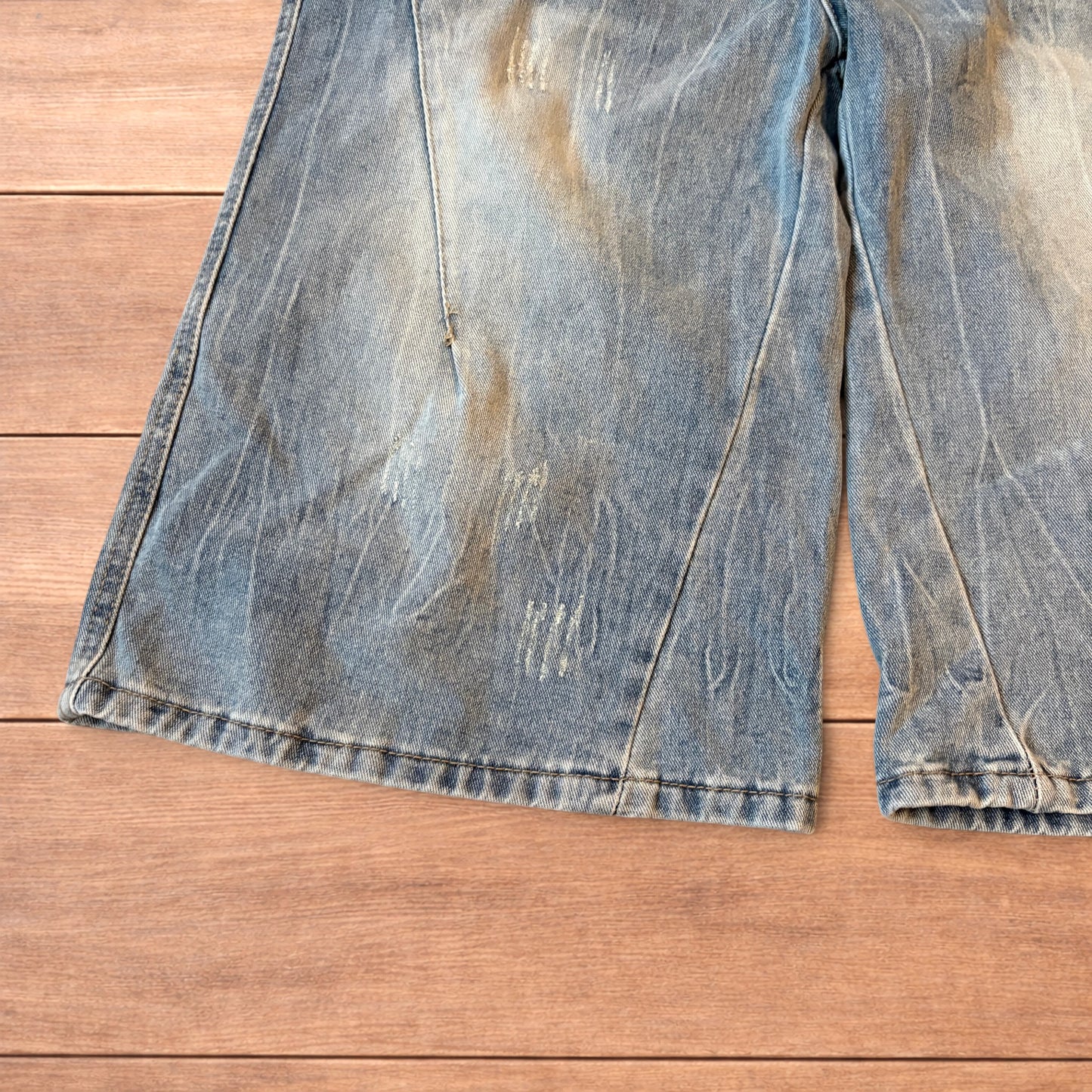 Light blue baggy wide leg denim shorts jorts with faded wash and elasticated back waistband