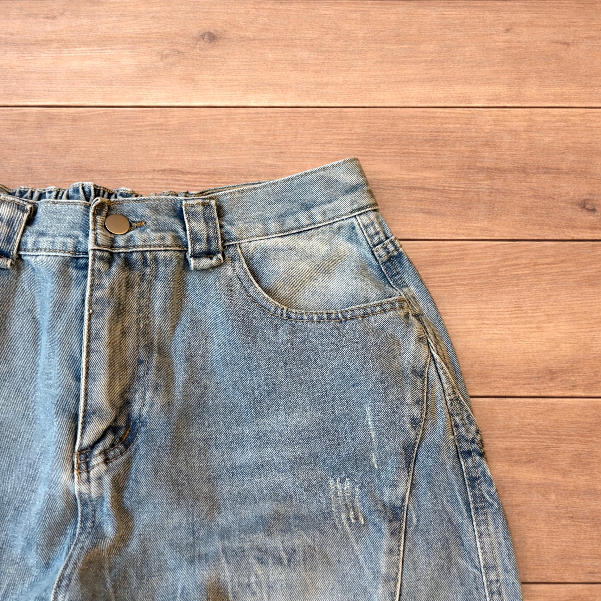 Light blue baggy wide leg denim shorts jorts with faded wash and elasticated back waistband