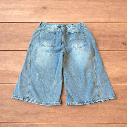 Light blue baggy wide leg denim shorts jorts with faded wash and elasticated back waistband