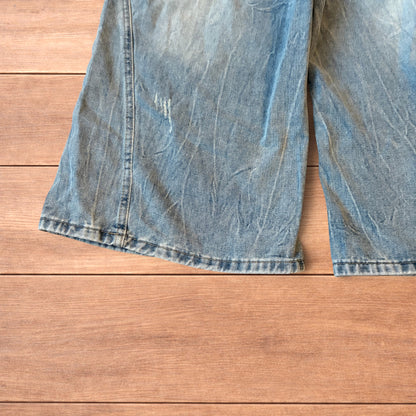 Light blue baggy wide leg denim shorts jorts with faded wash and elasticated back waistband