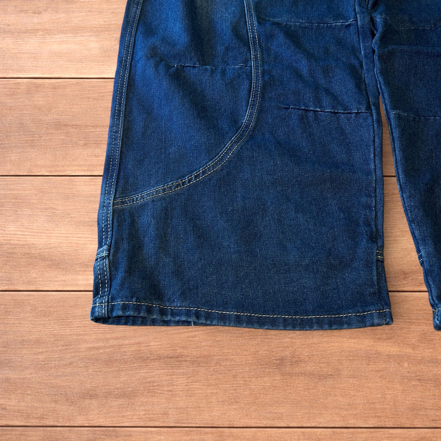 Incredible vintage style baggy wide leg skater fit jeans with fade in dark blue.