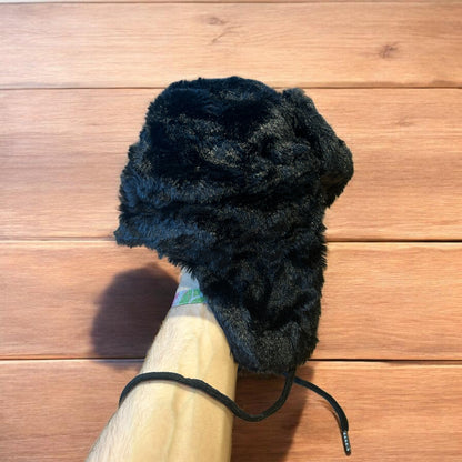 Russian ushanka trapper ear flap winter hat in black colour way.