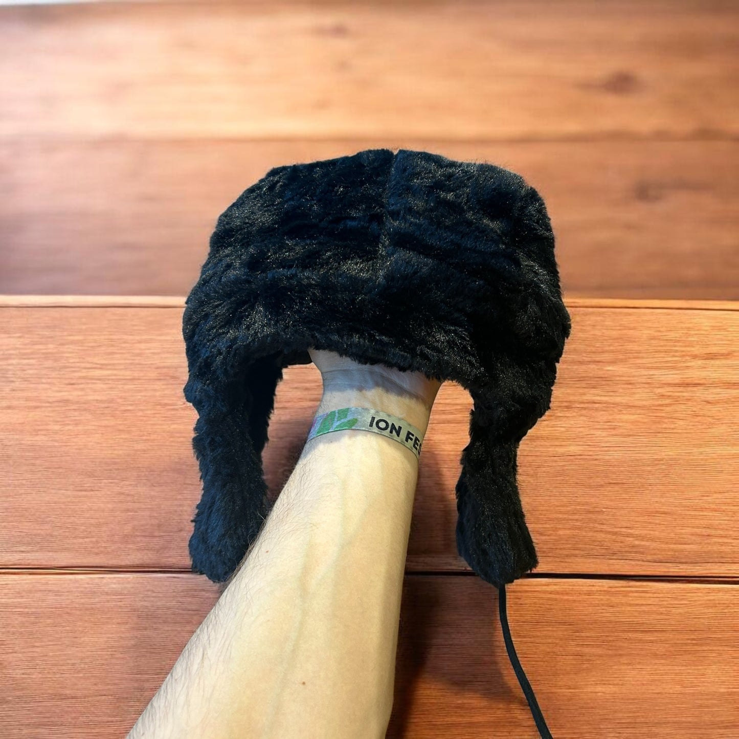 Russian ushanka trapper ear flap winter hat in black colour way.