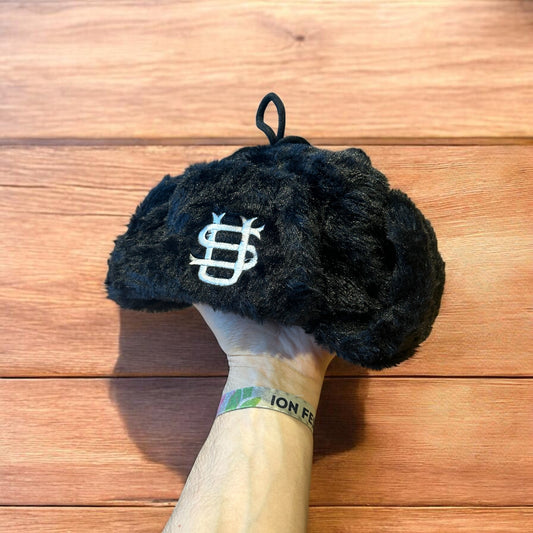 Russian ushanka trapper ear flap winter hat in black colour way.