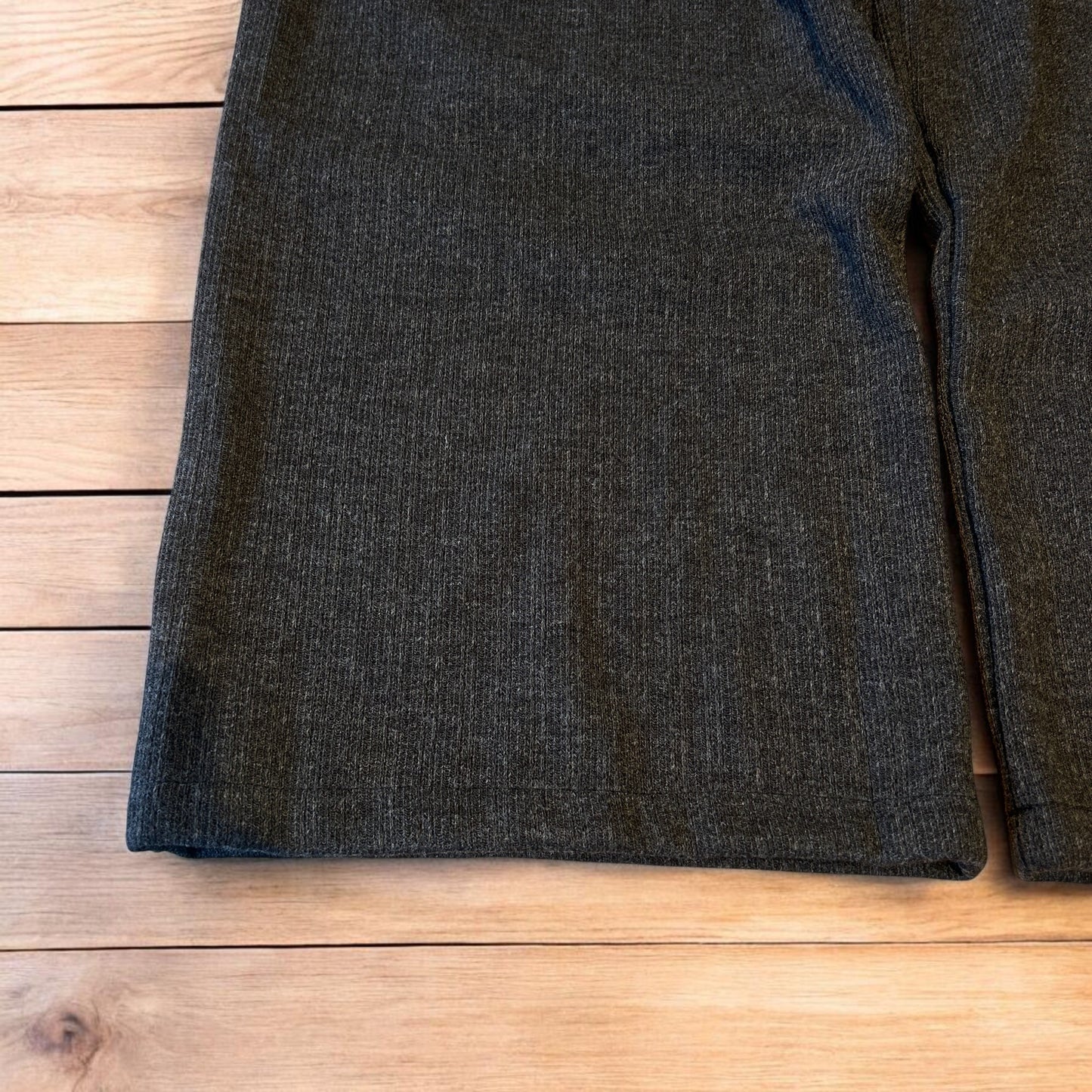 Vintage style baggy wide leg tailored wool pleated trousers in brown.