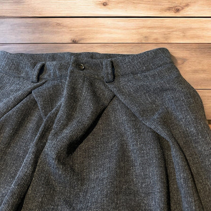 Vintage style baggy wide leg tailored wool pleated trousers in brown.