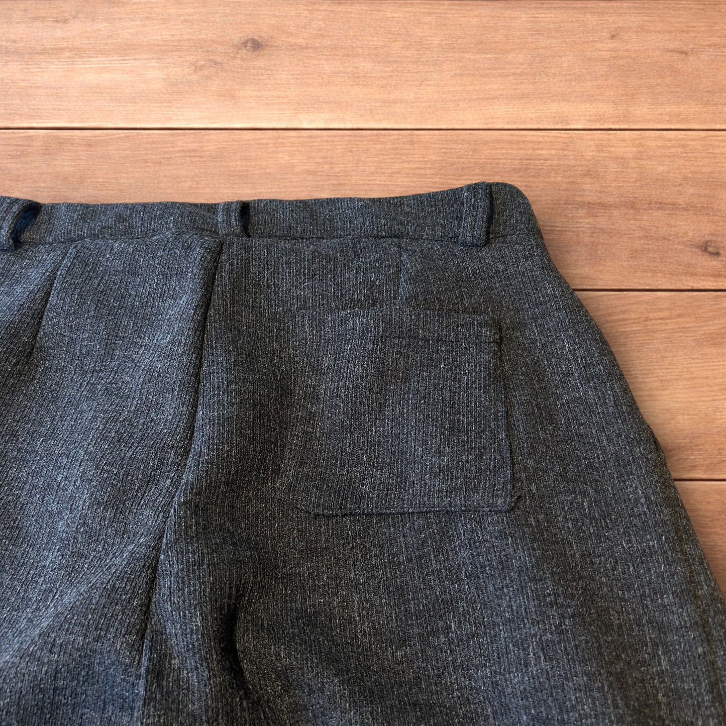 Vintage style baggy wide leg tailored wool pleated trousers in grey.
