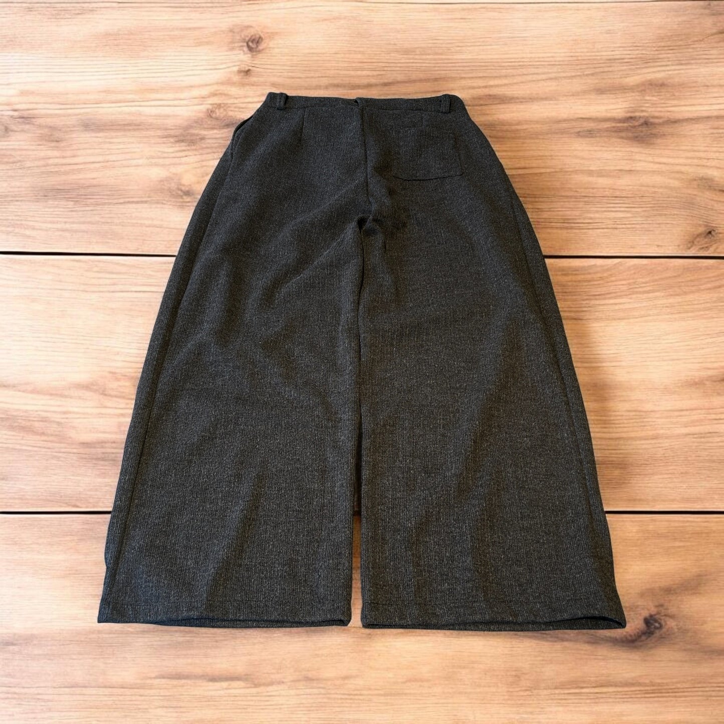 Vintage style baggy wide leg tailored wool pleated trousers in brown.