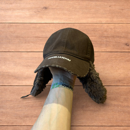 Vintage style trapper Russian ear flap hat cap in brown colour way.