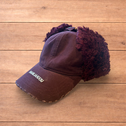 Vintage style trapper Russian ear flap hat cap in maroon/red colour way.