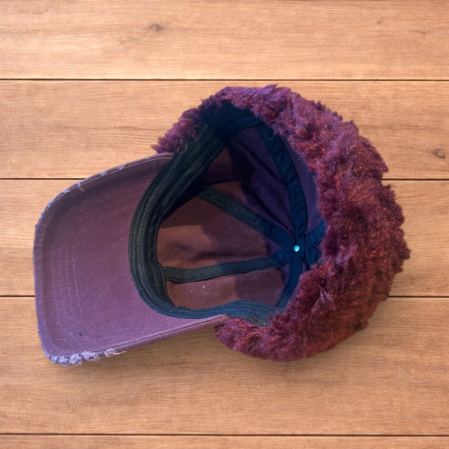 Vintage style trapper Russian ear flap hat cap in maroon/red colour way.