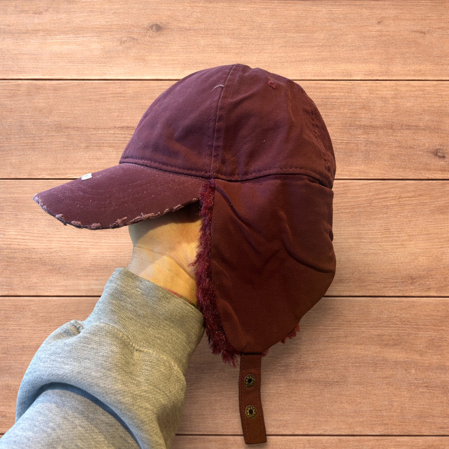 Vintage style trapper Russian ear flap hat cap in maroon/red colour way.