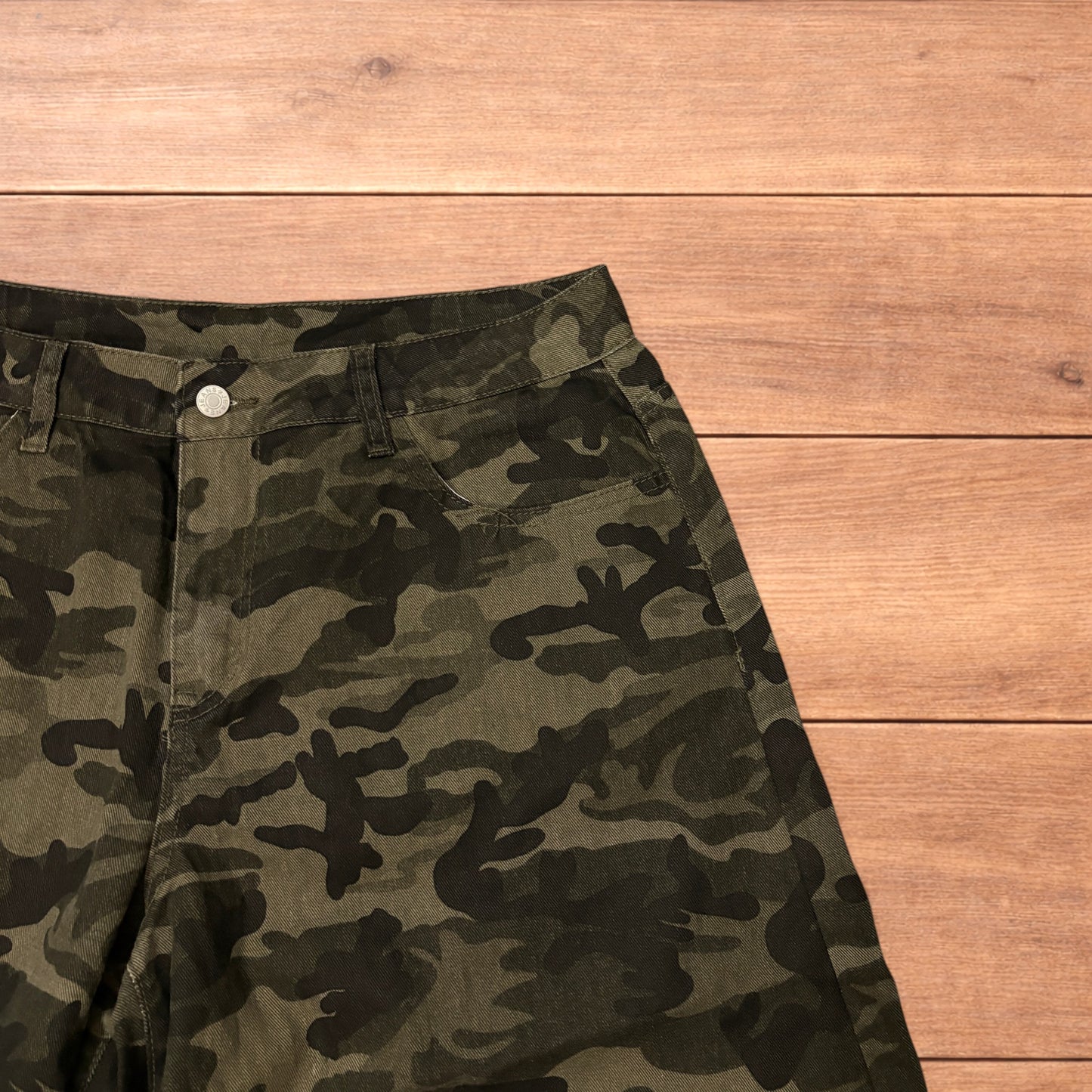 Baggy wide leg cargo shorts in army camo.