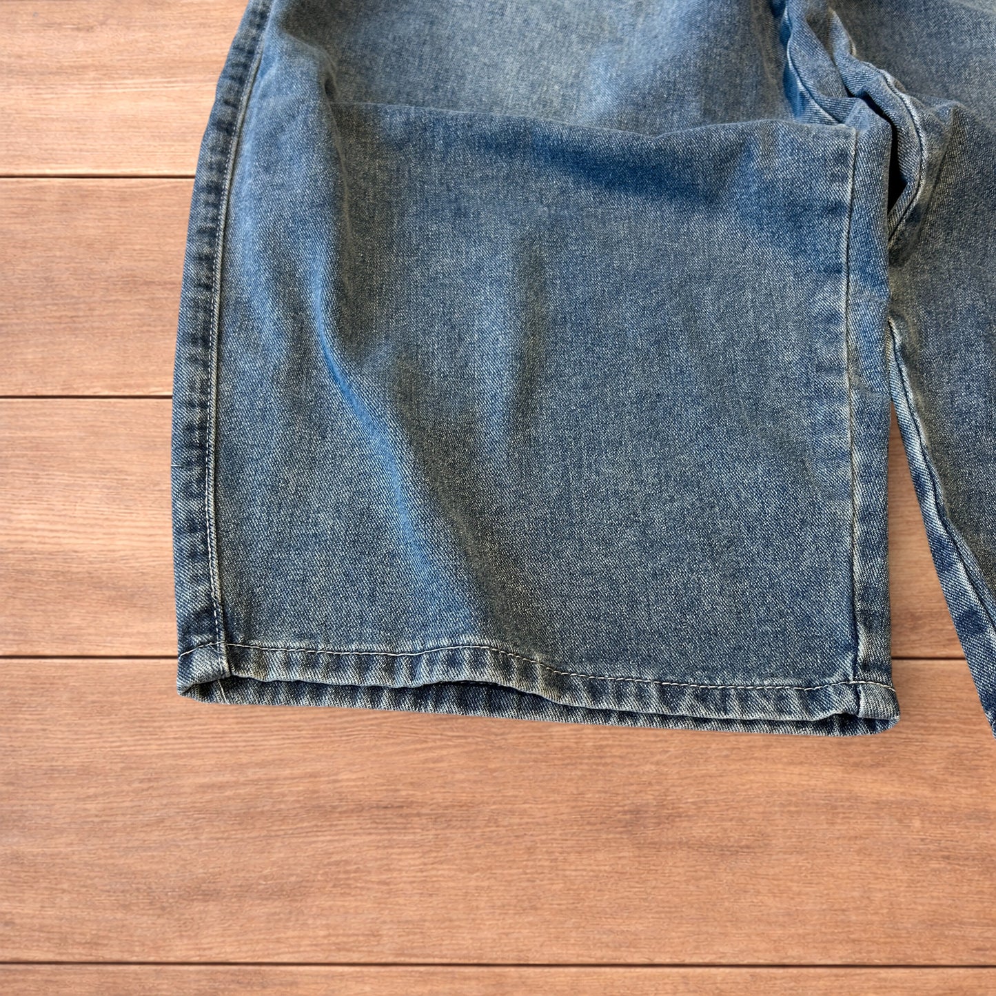 Vintage skater style baggy wide leg fit jeans with fade in mid blue.