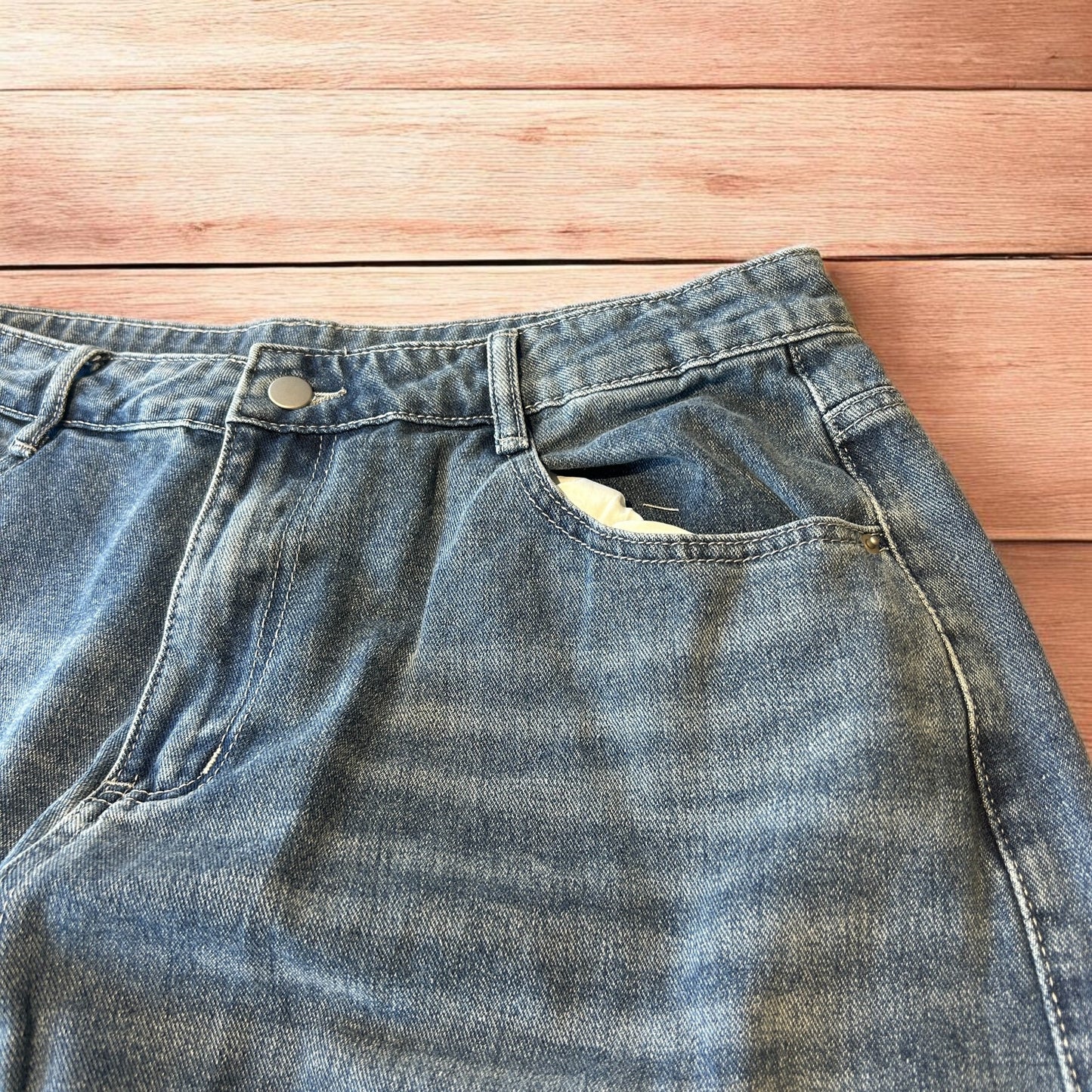 Vintage skater style baggy wide leg fit jeans with fade in mid blue.