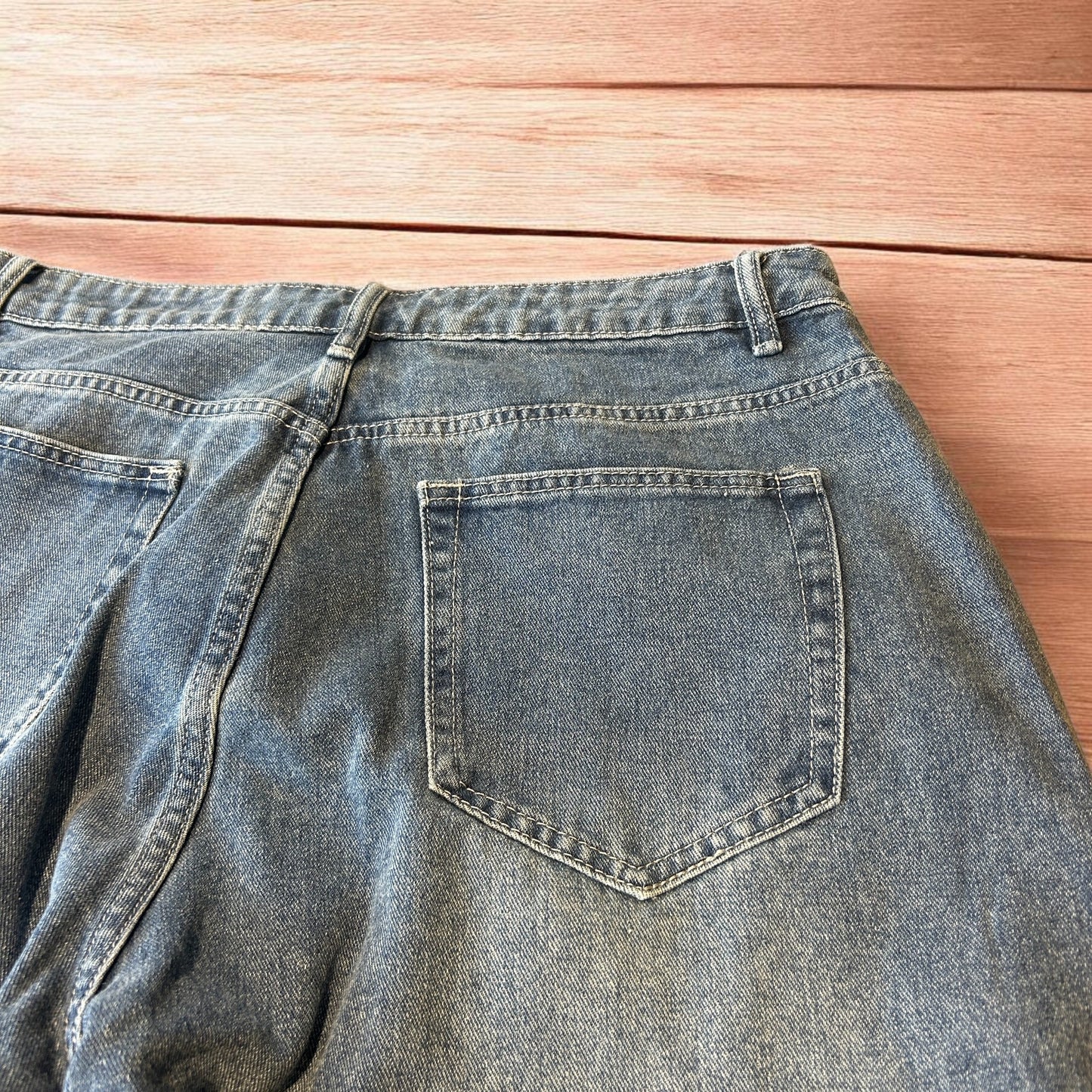 Vintage skater style baggy wide leg fit jeans with fade in mid blue.