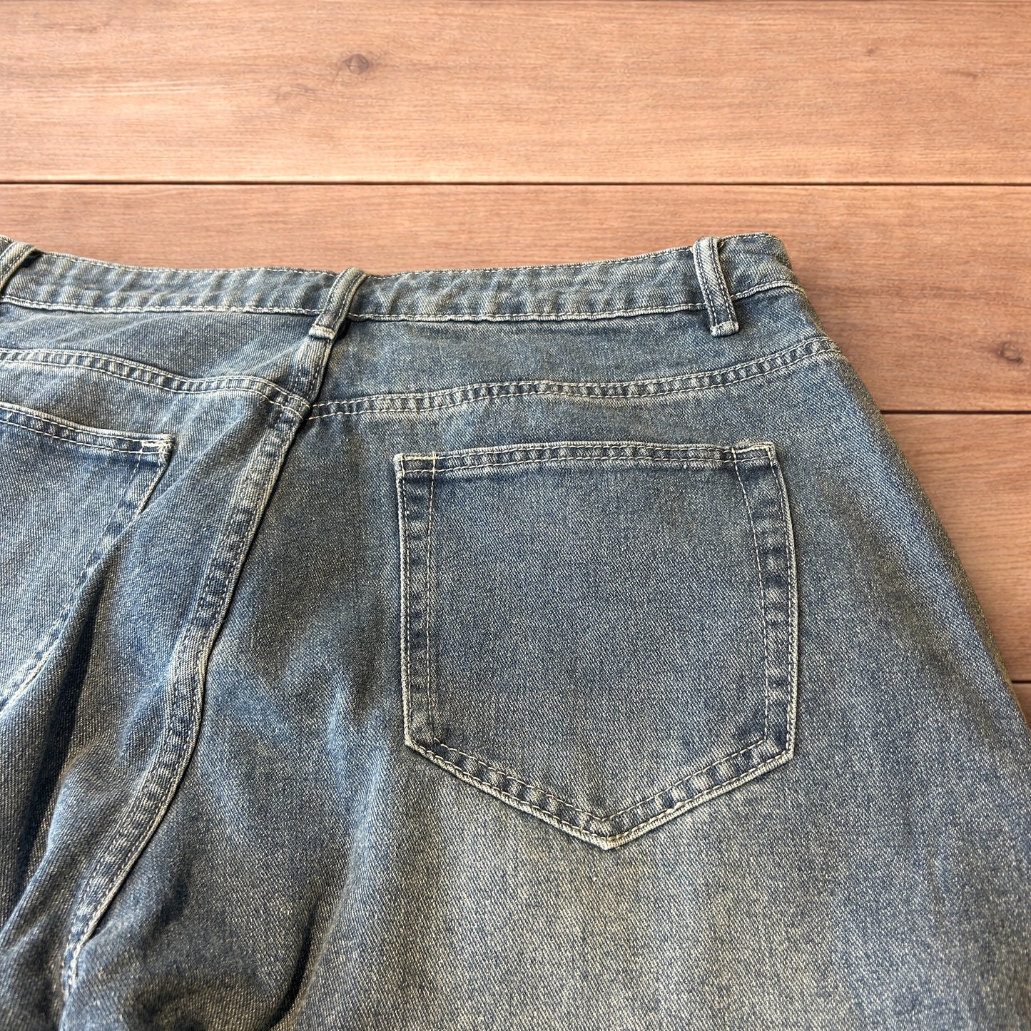 Vintage skater style baggy wide leg fit jeans with fade in mid blue.