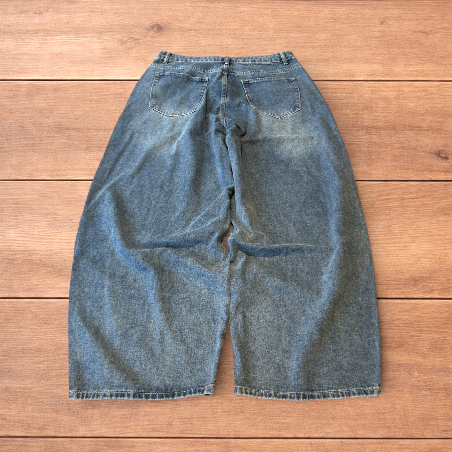 Vintage skater style baggy wide leg fit jeans with fade in mid blue.