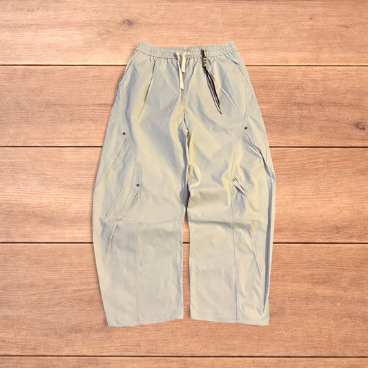 Baggy gorpcore tech hiking pants in beige.