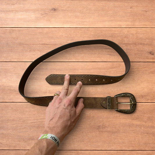 Vintage style faux leather western cowboy gothic belt in brown with brass trim.