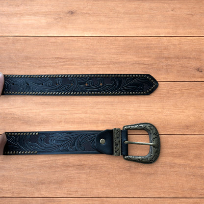 Vintage style faux leather western cowboy gothic belt in black with brass trim.