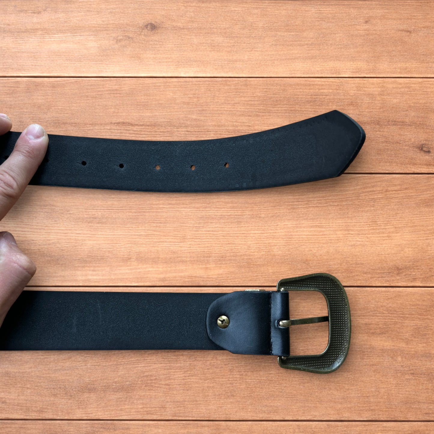 Vintage style faux leather western cowboy gothic belt in black with brass trim.