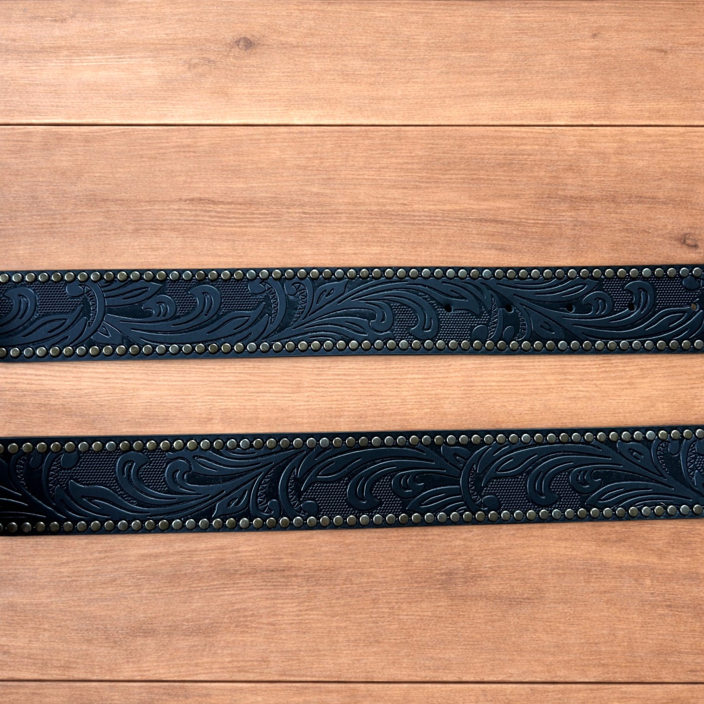 Vintage style faux leather western cowboy gothic belt in black with brass trim.