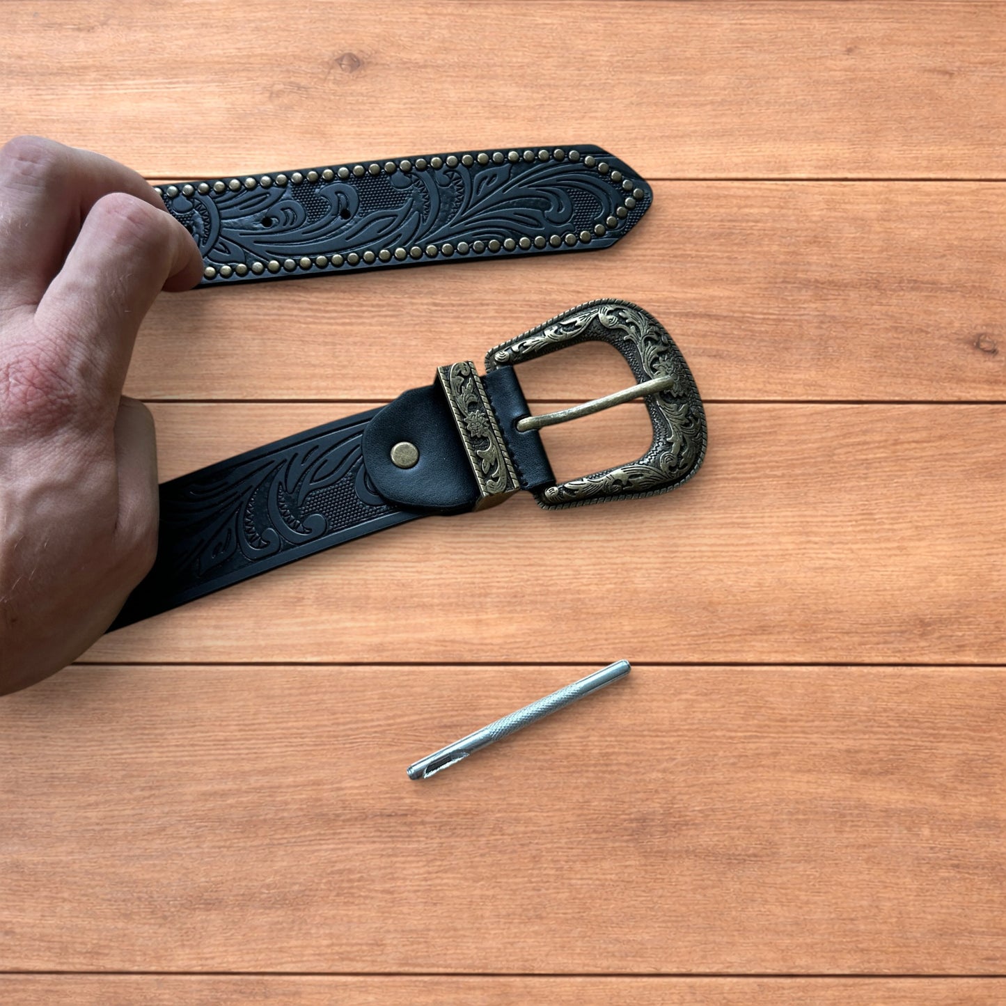 Vintage style faux leather western cowboy gothic belt in black with brass trim.