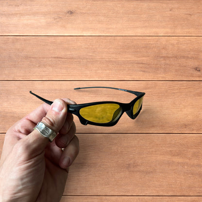 Insane polarised sunglasses in black with yellow lense.