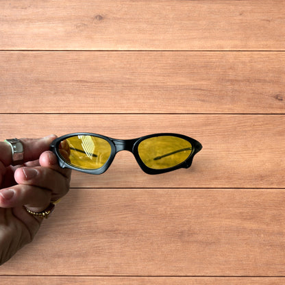 Insane polarised sunglasses in black with yellow lense.