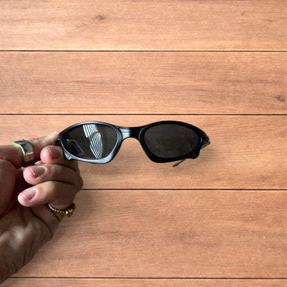Insane polarised sunglasses in black with black lense.