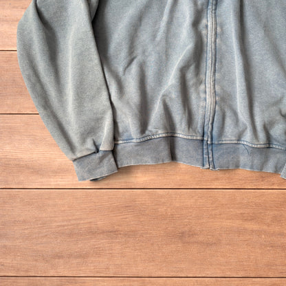 Light blue vintage style baggy zip up hoodie jumper laid flat showing front, back and details.