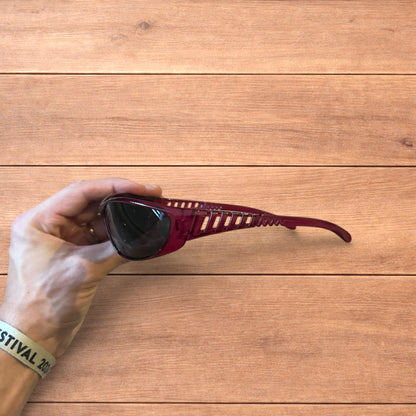 Cool wrap around sunglasses in pink/purple frame with black lense.